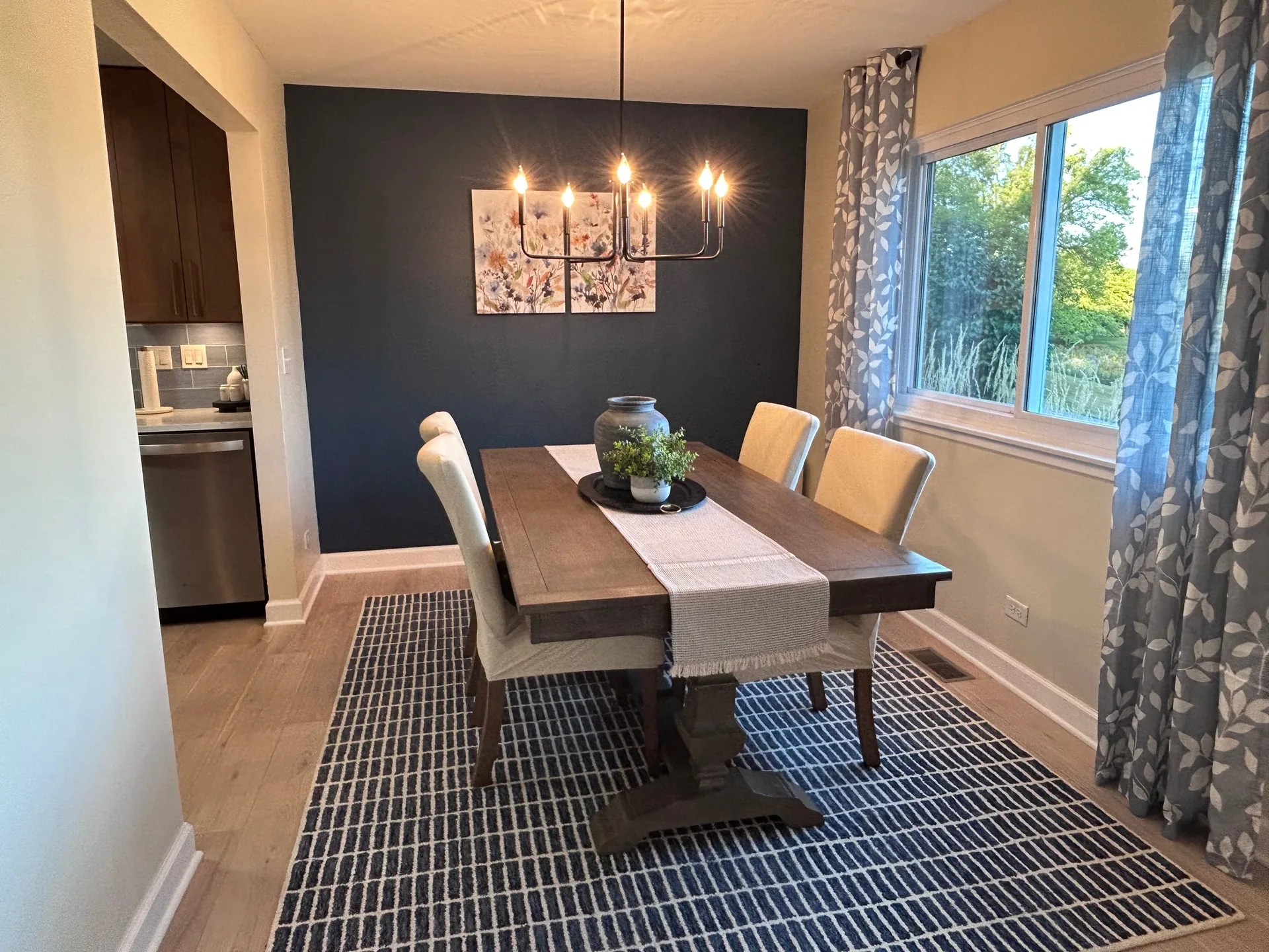 Dining room with navy accent wall